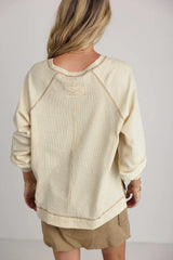 Beige Exposed Seam Textured Knit V Neck Pullover Top from MsDressly
