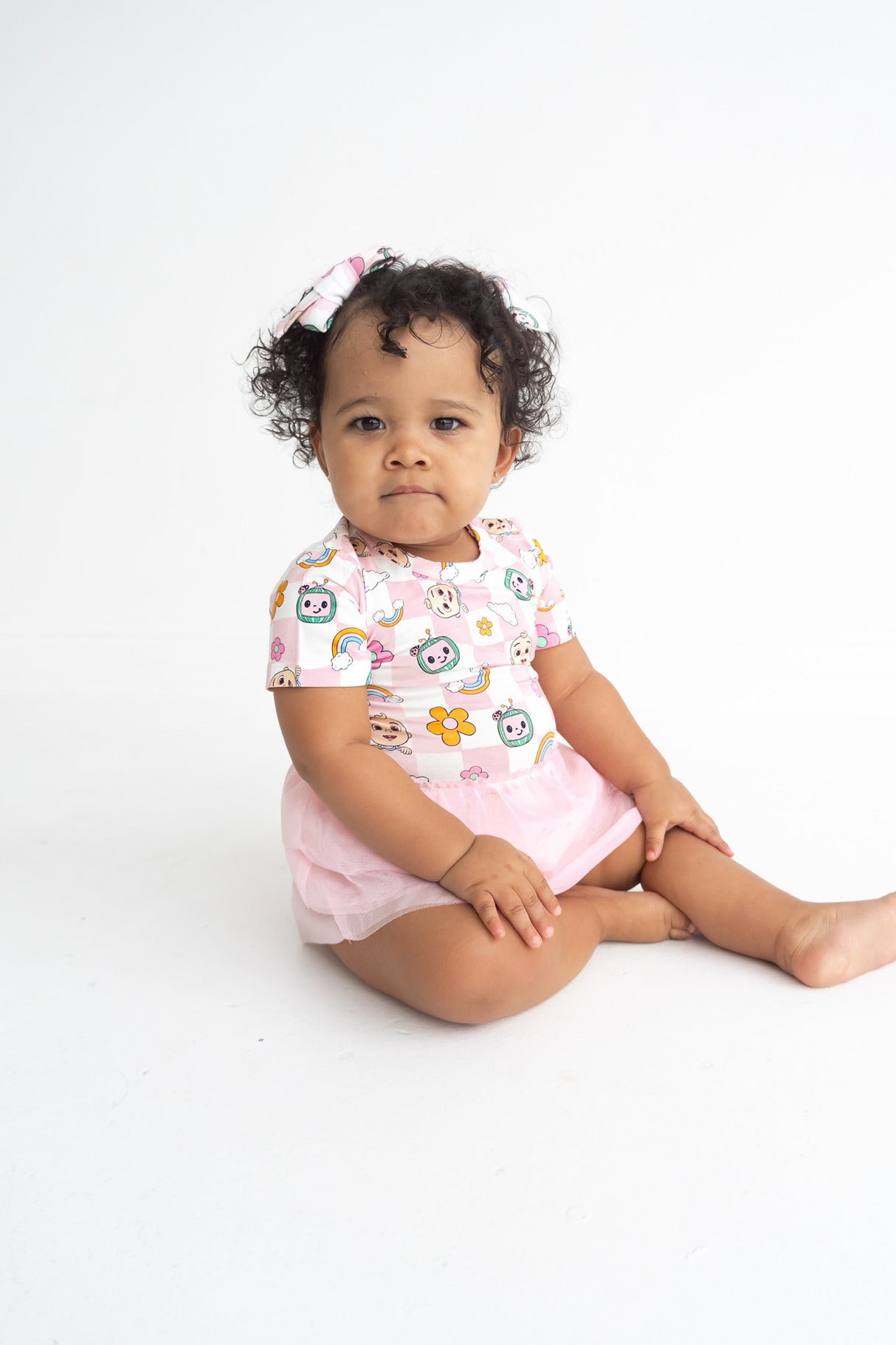 Dream Big Little Co x CoComelon JJ RAINBOW CHECKERS DREAM TUTU SHORT SLEEVE BODYSUIT DRESS from DREAM BIG LITTLE CO