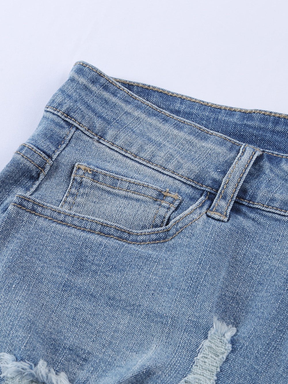 Distressed Denim Shorts with Lace-Up Sides from MsDressly