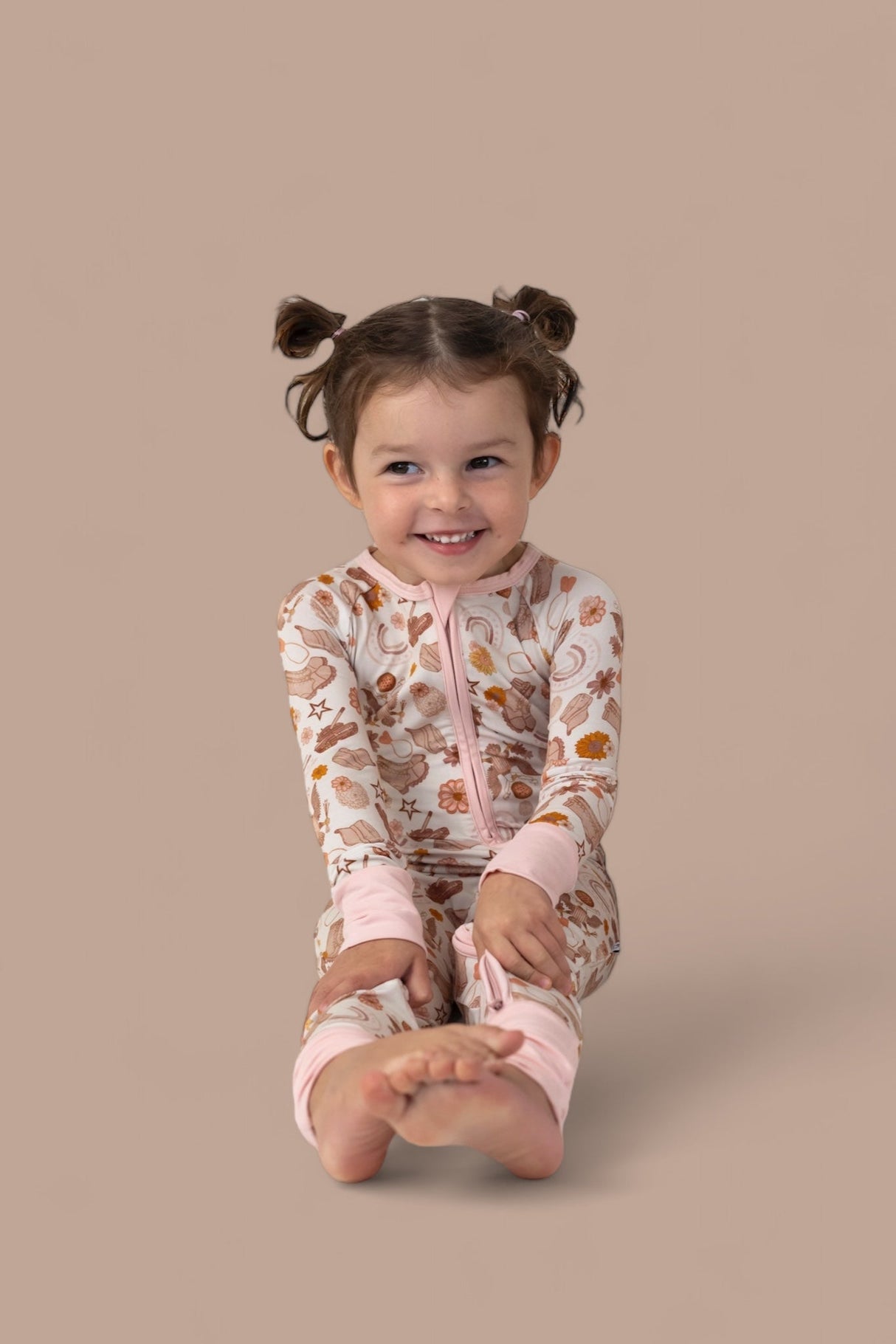 FLOWERS AND BOOTS DREAM ROMPER from DREAM BIG LITTLE CO
