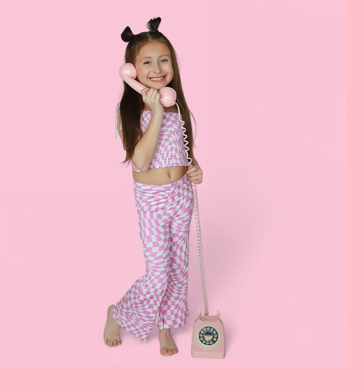 BUBBLEGUM WAVY CHECKERS DREAM SMOCKED FLARE SET from DREAM BIG LITTLE CO