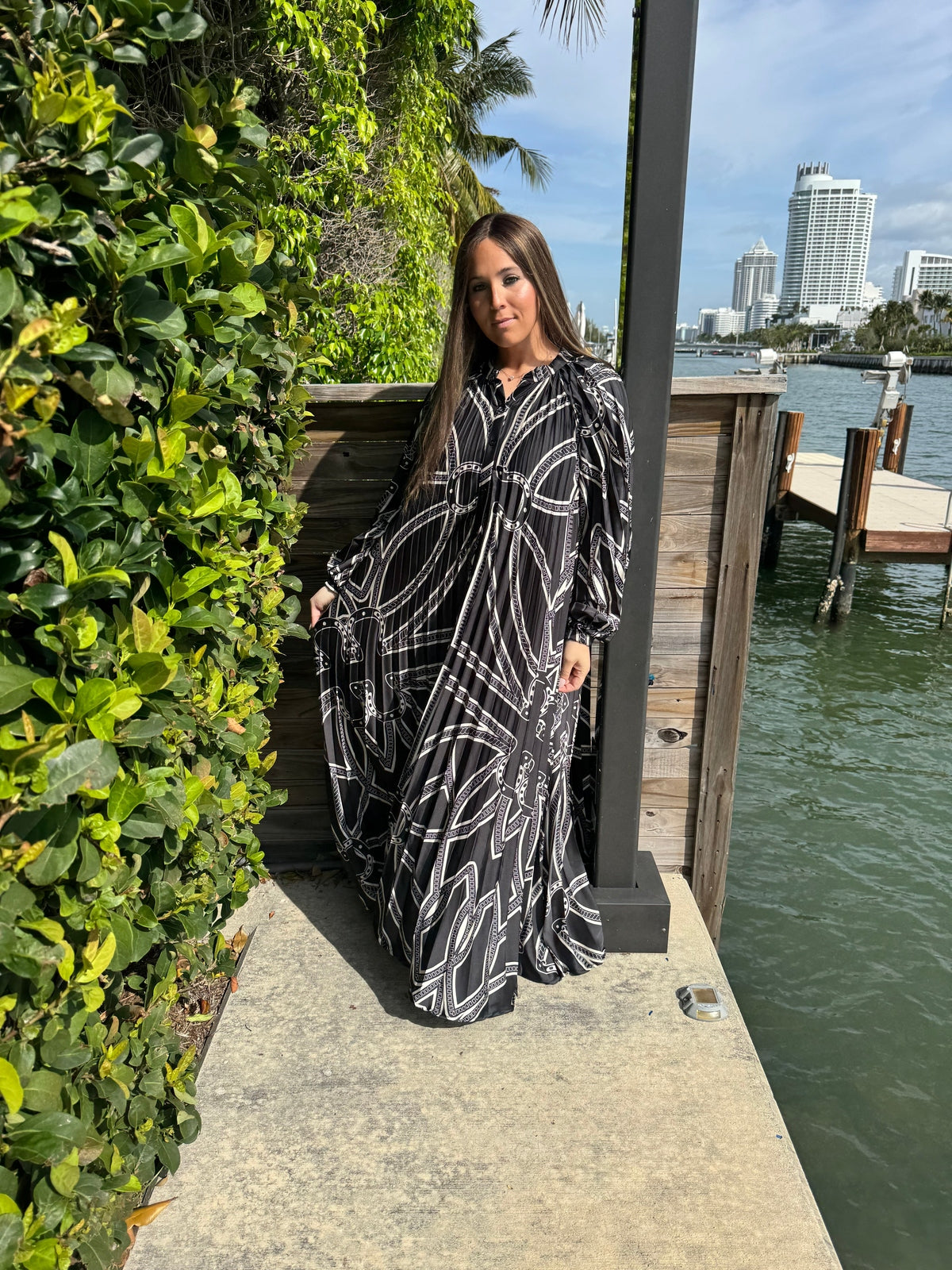 Black Horseshoe Beauty Pleated Dress From Drama NYC Plus
