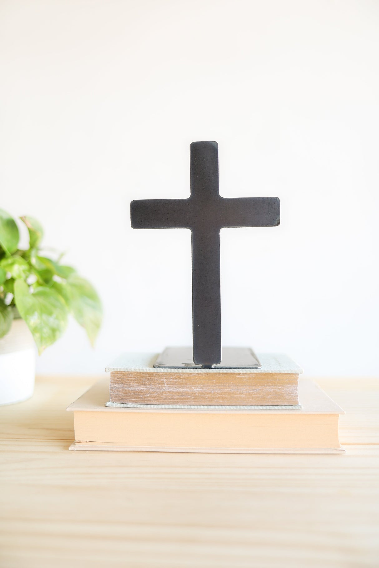 Cross Bookend from Jubilee Trading Company