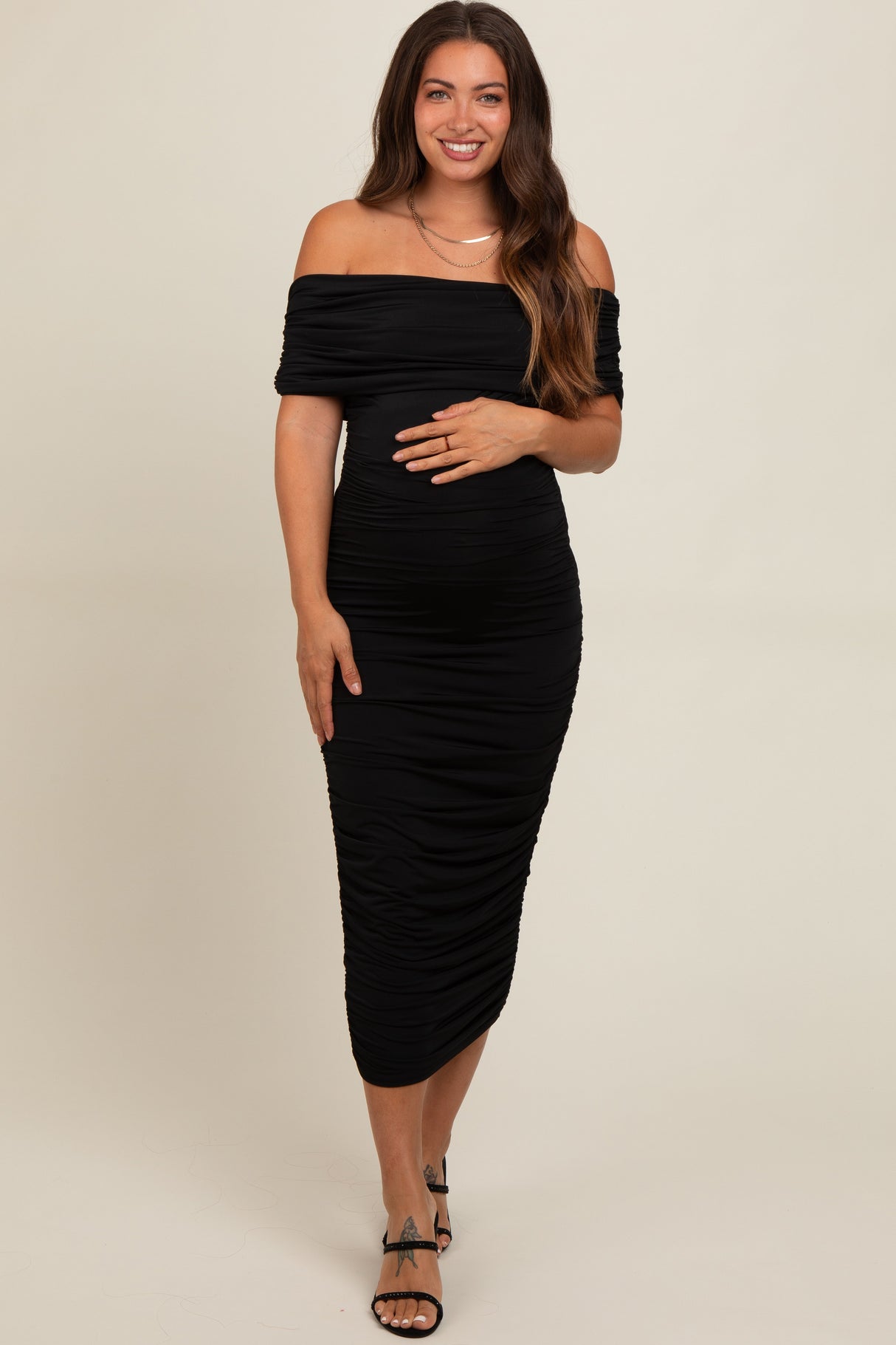 Black Off Shoulder Ruched Maternity Midi Dress from PinkBlush