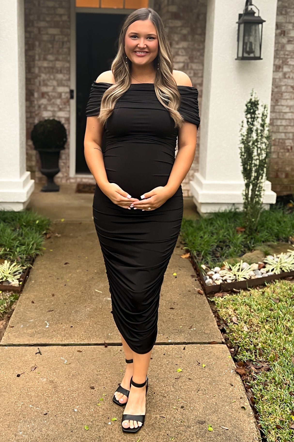 Black Off Shoulder Ruched Maternity Midi Dress from PinkBlush