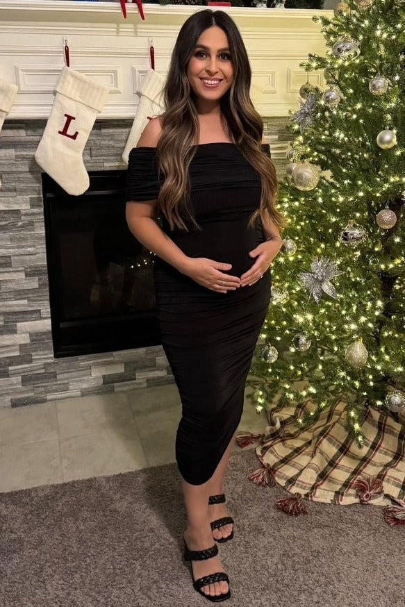 Black Off Shoulder Ruched Maternity Midi Dress from PinkBlush
