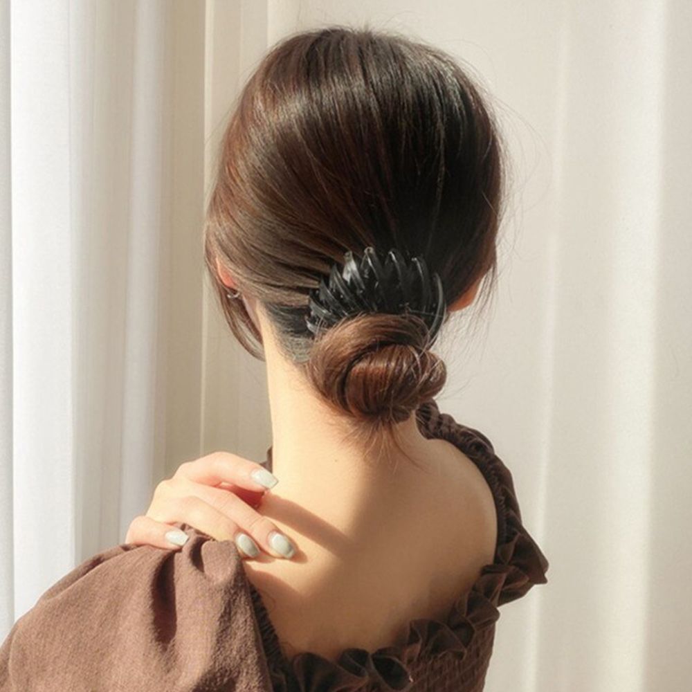 BIRD NEST PONYTAIL HAIR CLAW from Ashlen