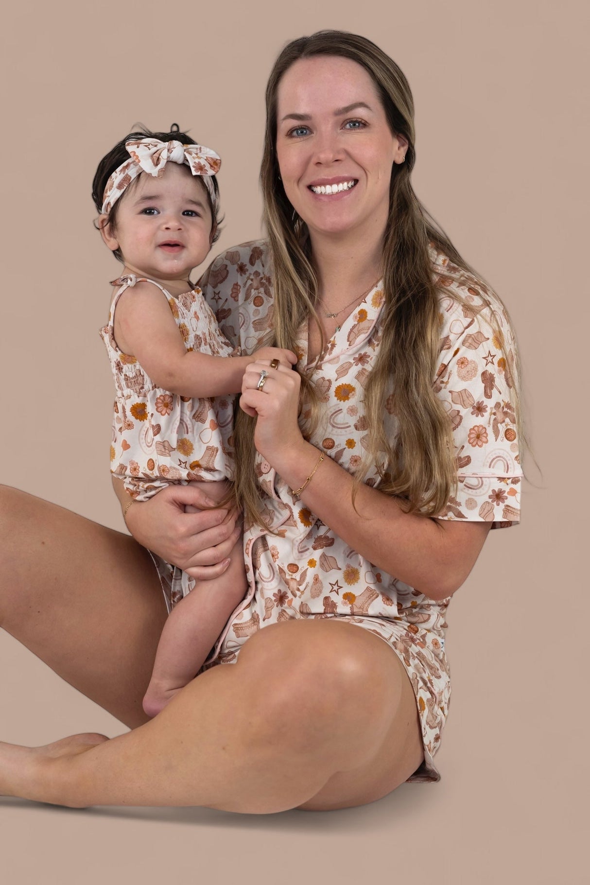 FLOWERS AND BOOTS DREAM BUBBLE ROMPER from DREAM BIG LITTLE CO