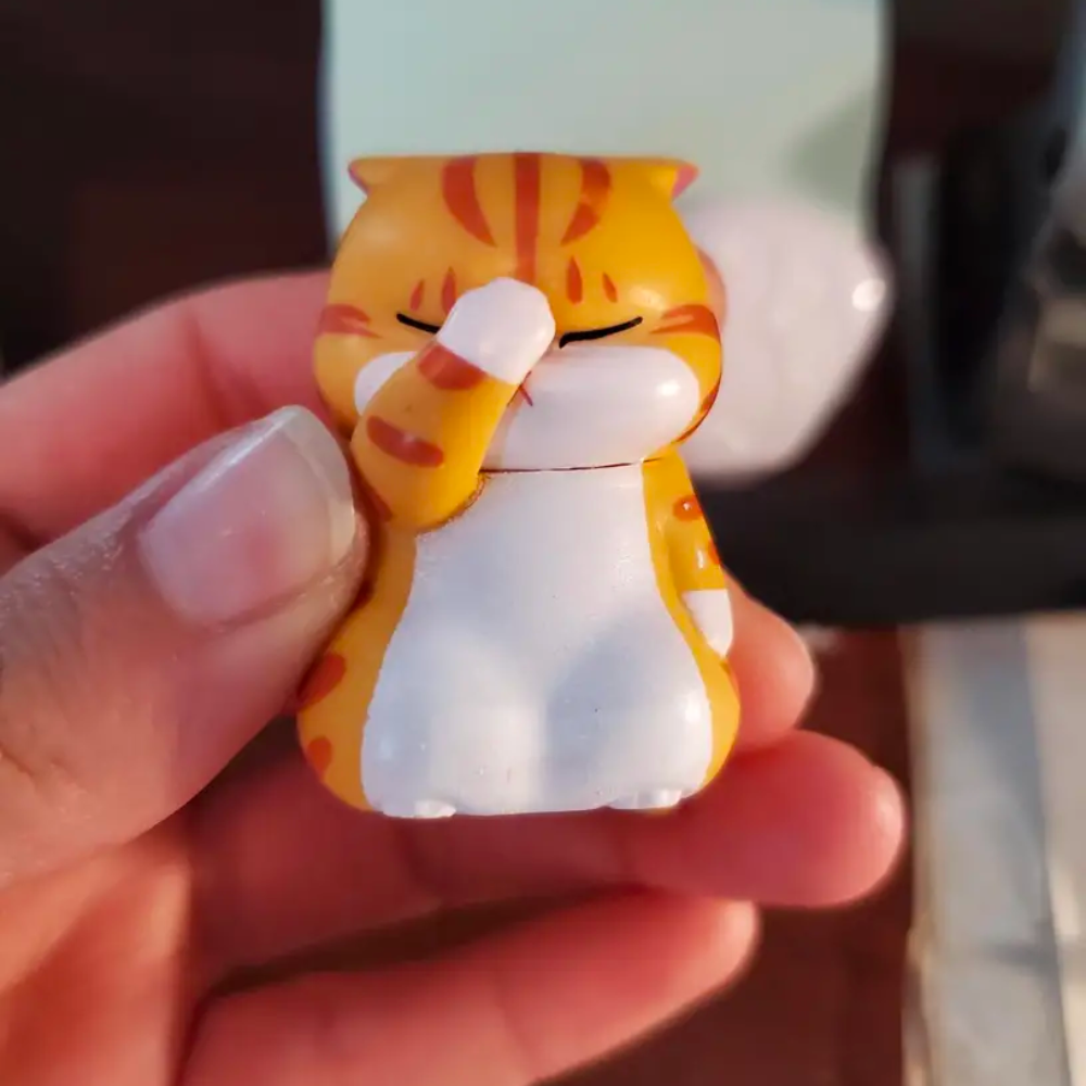 Cat Face Palm Figurine from Moderny