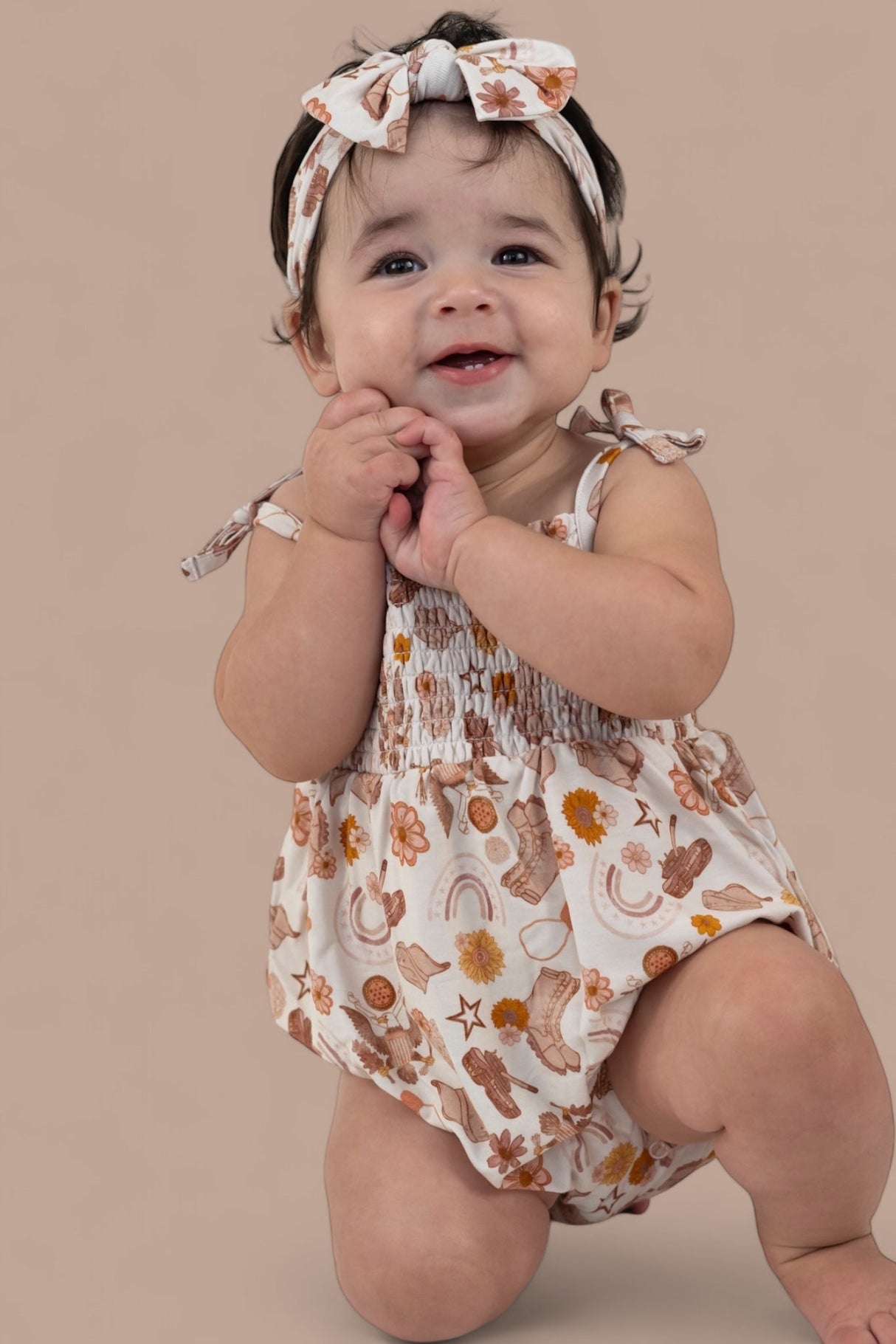 FLOWERS AND BOOTS DREAM BUBBLE ROMPER from DREAM BIG LITTLE CO