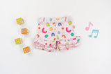 Dream Big Little Co x CoComelon ALPHABET DREAM RUFFLE SHORTS from DREAM BIG LITTLE CO