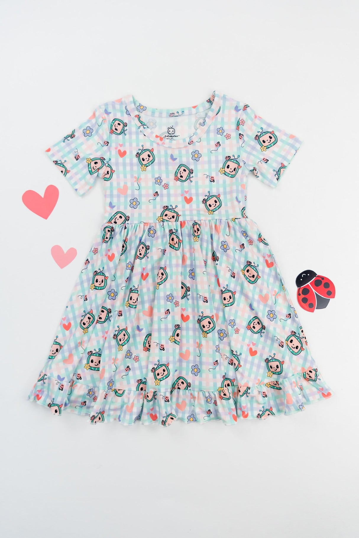 Dream Big Little Co x CoComelon SPRINGTIME MELON SHORT SLEEVE DREAM RUFFLE DRESS from DREAM BIG LITTLE CO