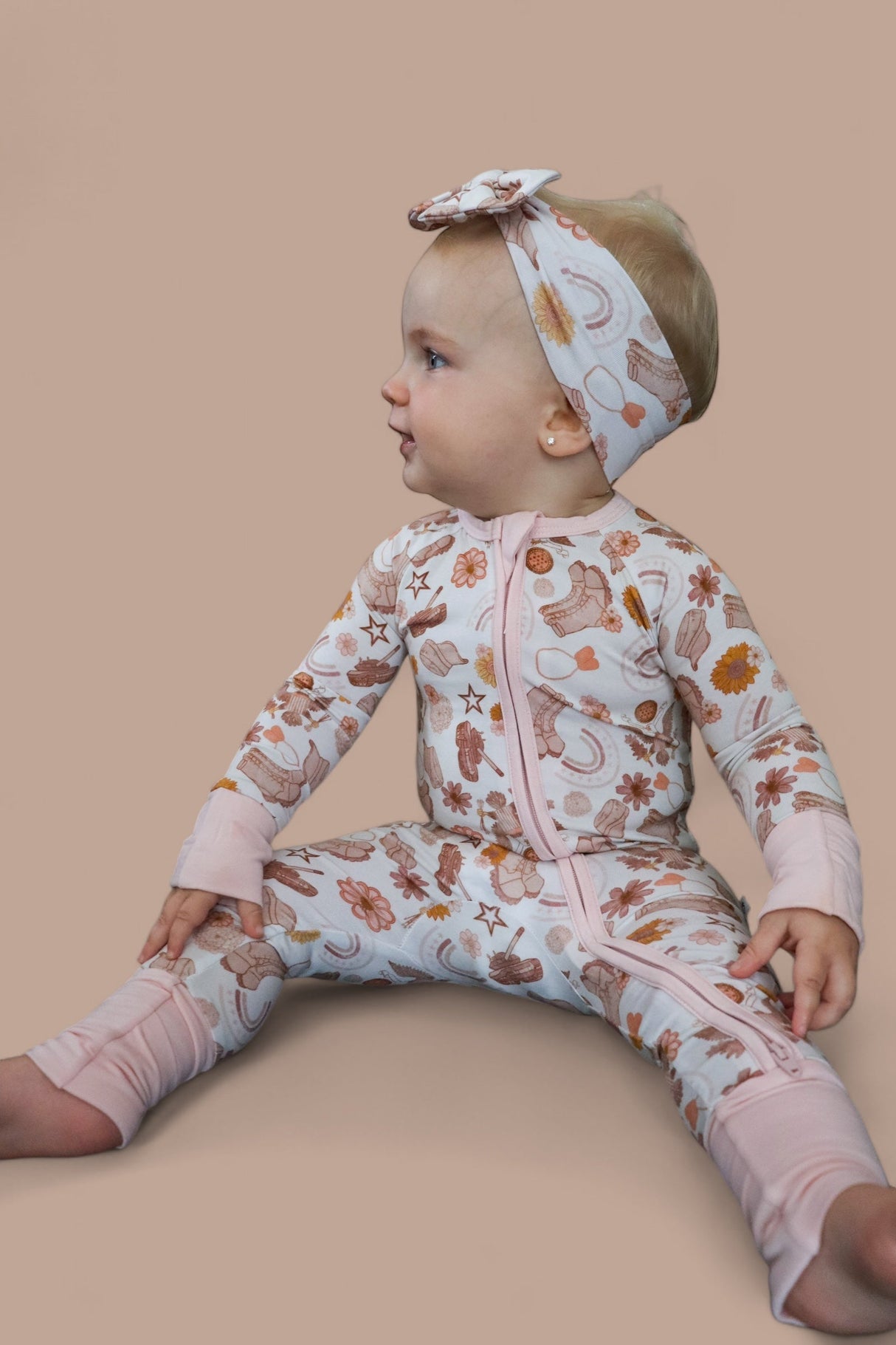 FLOWERS AND BOOTS DREAM ROMPER from DREAM BIG LITTLE CO