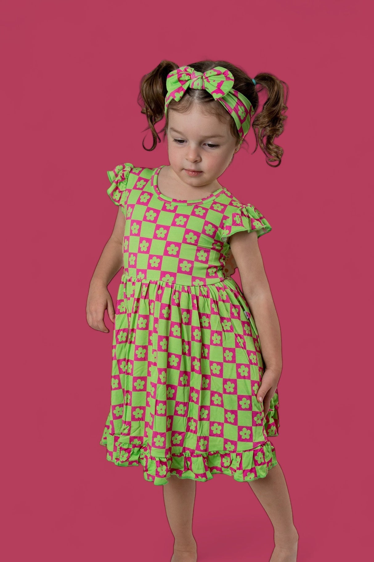 WILD DAISY CHECKERS DREAM RUFFLE DRESS from DREAM BIG LITTLE CO