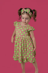 WILD DAISY CHECKERS DREAM RUFFLE DRESS from DREAM BIG LITTLE CO