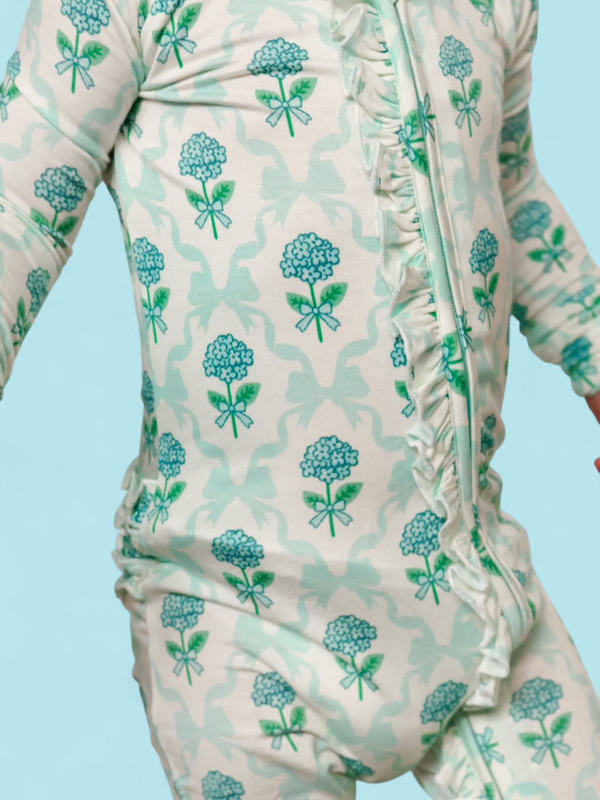 BLUE RIBBON BLOOMS DREAM RUFFLE ROMPER from DREAM BIG LITTLE CO