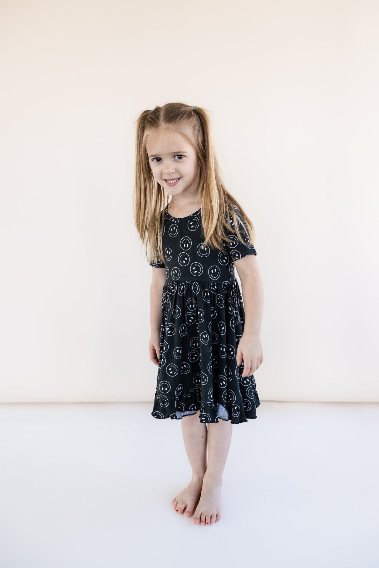 MIDNIGHT SMILES DREAM RUFFLE DRESS from DREAM BIG LITTLE CO