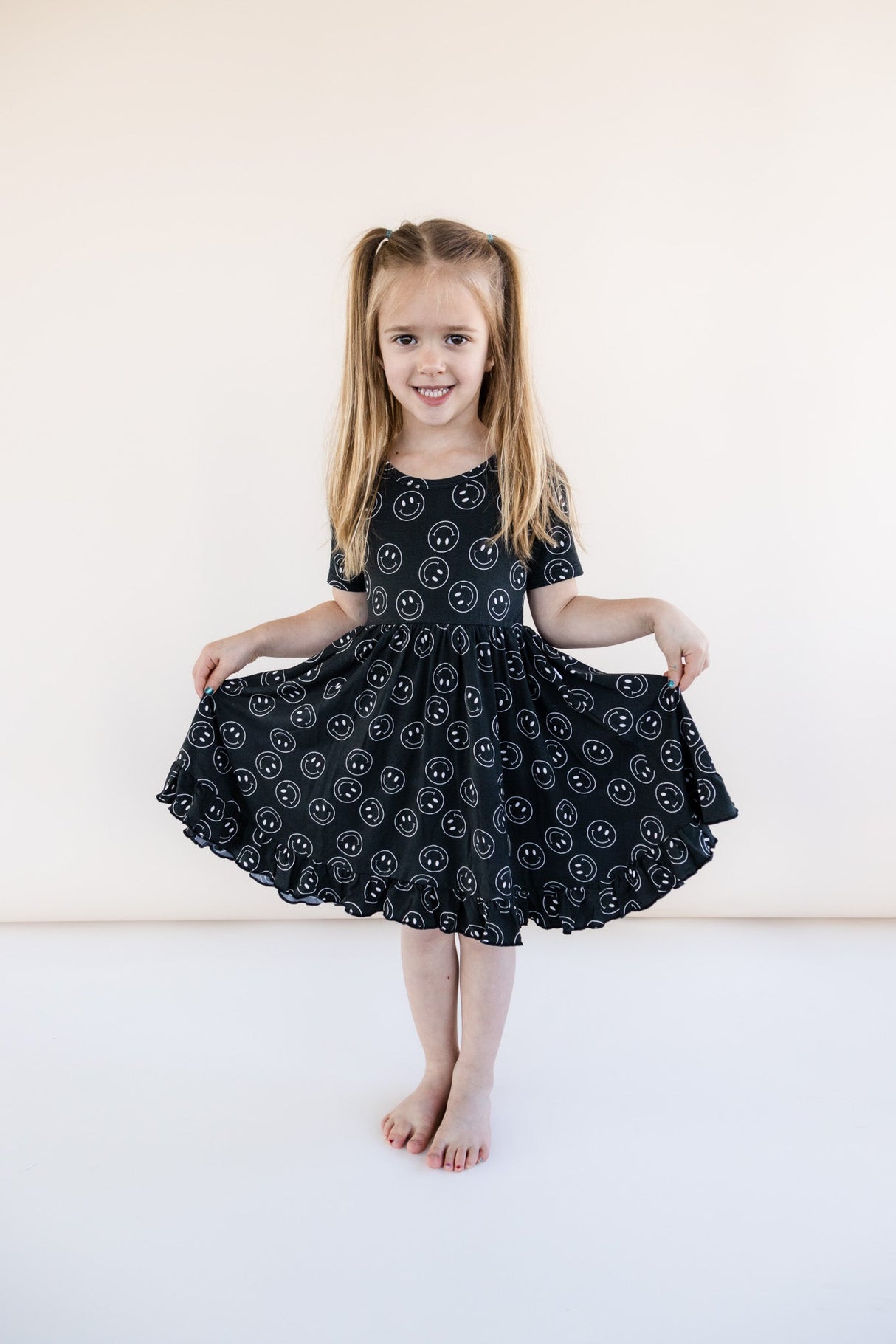 MIDNIGHT SMILES DREAM RUFFLE DRESS from DREAM BIG LITTLE CO