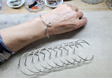 Silver Wire Sculpted Teardrop Bangle from Alexa Martha Designs