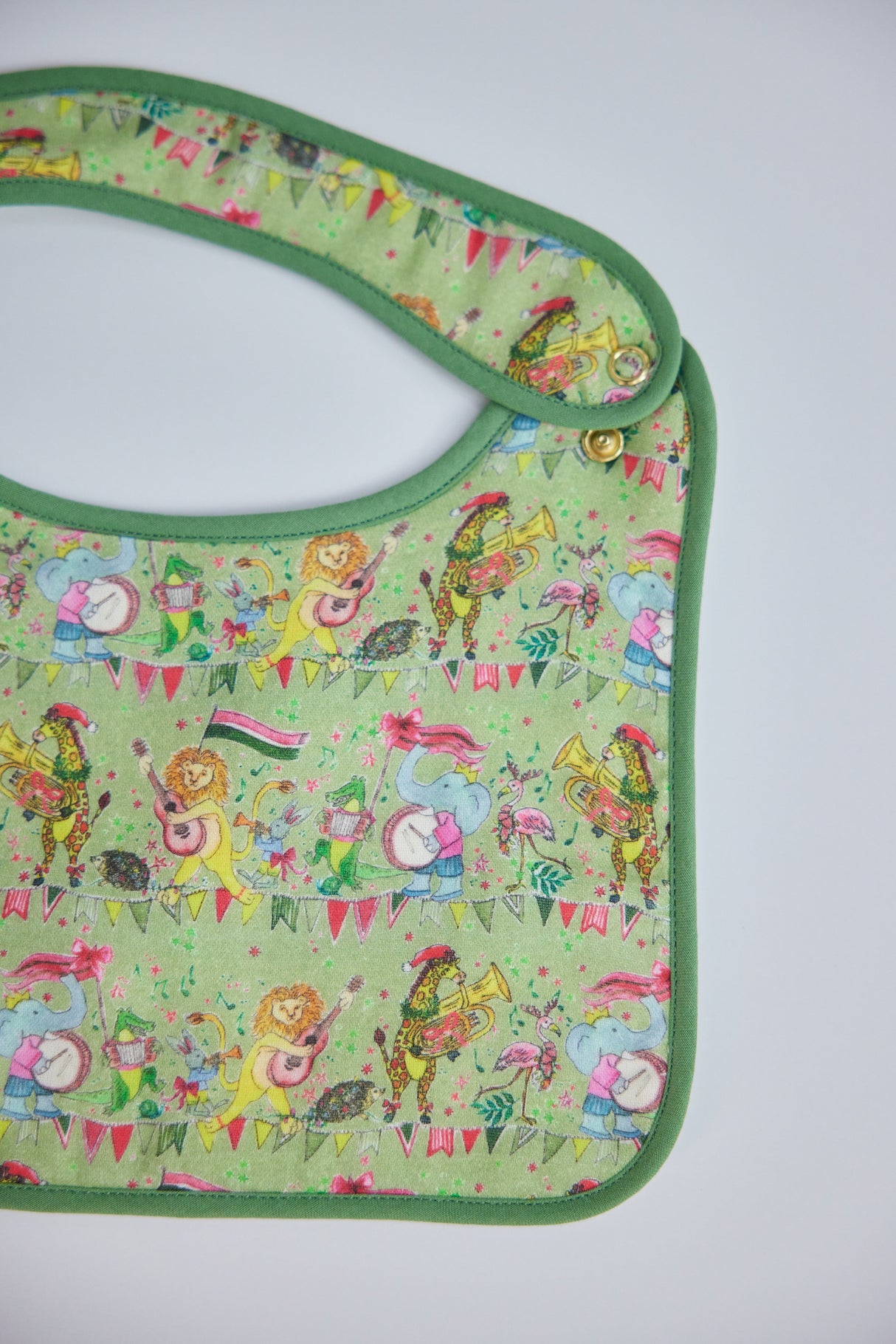 Jubilee Bib in Green from Timo & Violet