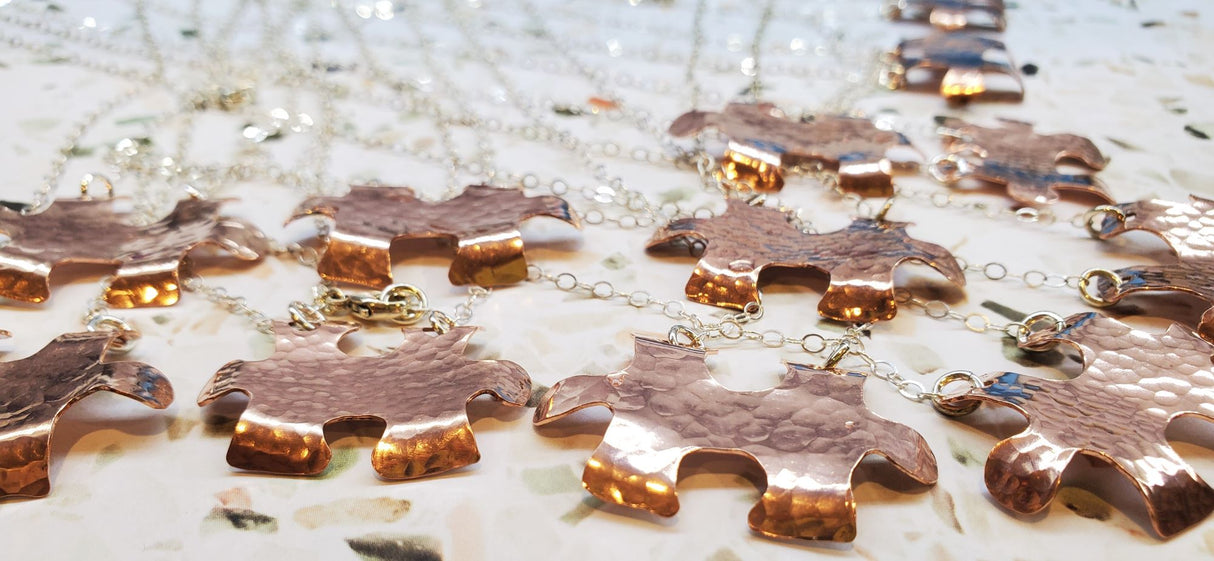 Handmade Hammered Copper Puzzle Piece Necklace from Alexa Martha Designs