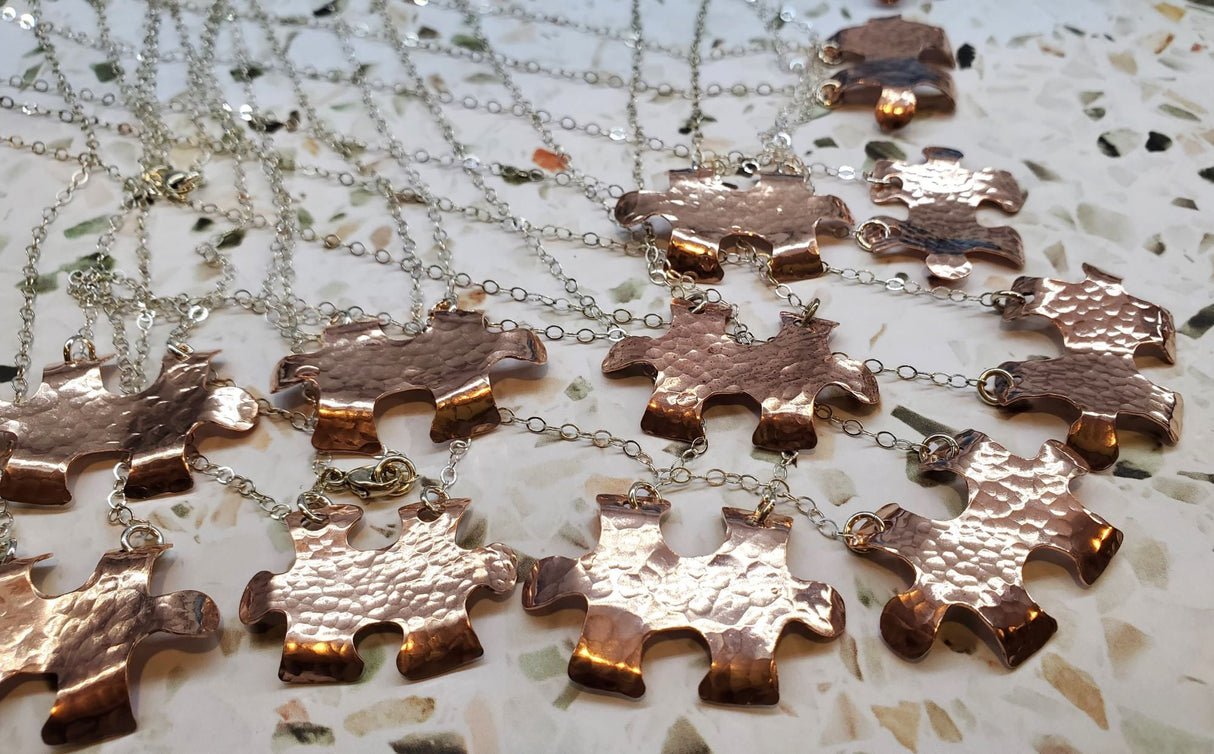 Handmade Hammered Copper Puzzle Piece Necklace from Alexa Martha Designs