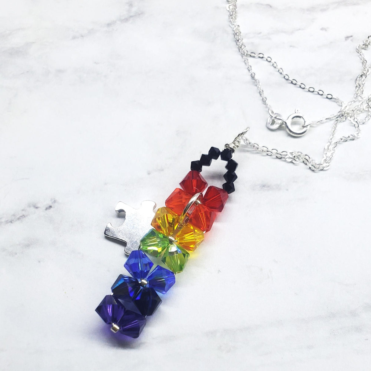 Wire Woven Rainbow Autism Puzzle Piece Bar Necklace-2024 Limited Edition from Alexa Martha Designs