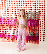 BUBBLEGUM WAVY CHECKERS DREAM SMOCKED FLARE SET from DREAM BIG LITTLE CO