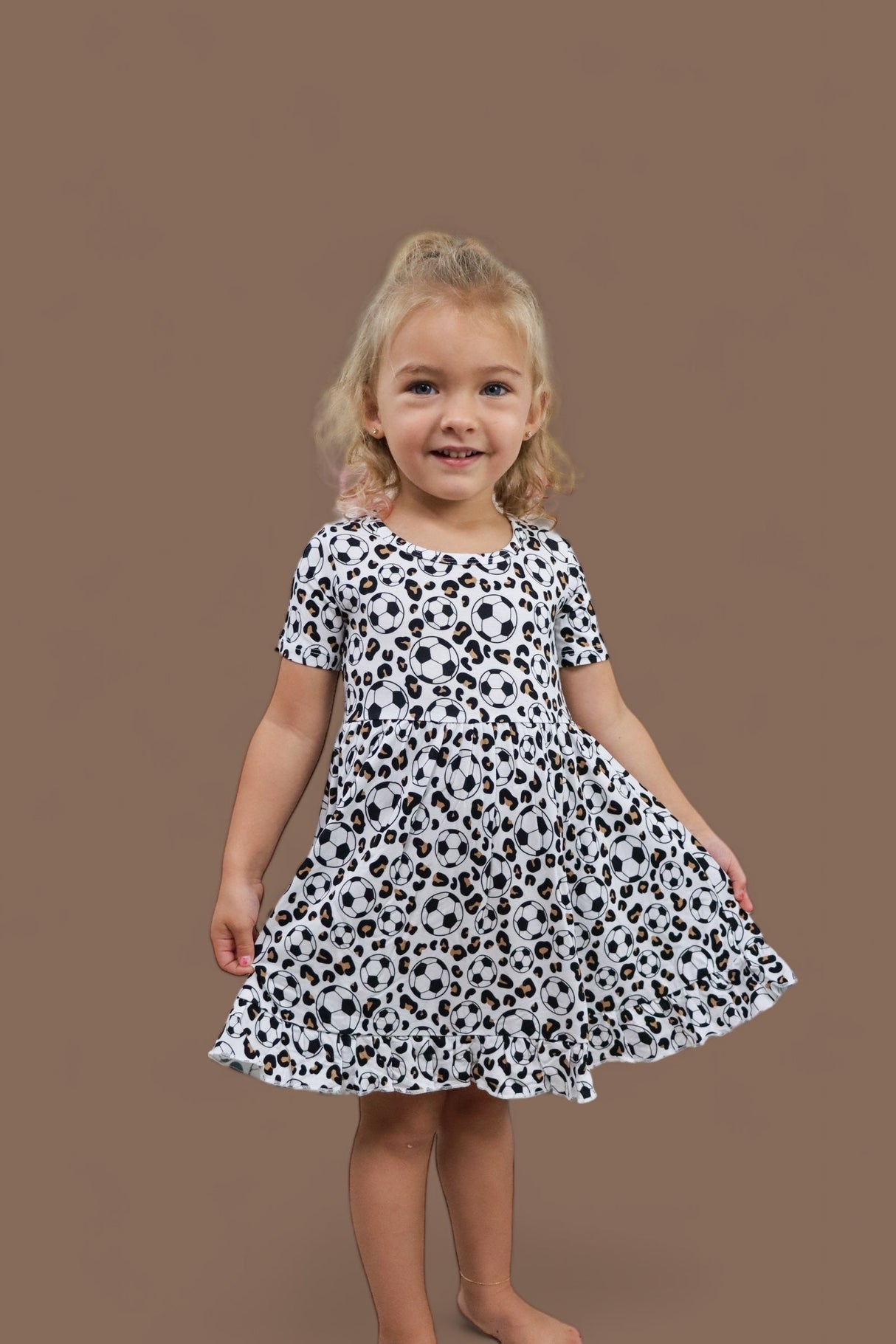 WILD GOALS DREAM RUFFLE DRESS from DREAM BIG LITTLE CO