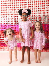 BUBBLEGUM WAVY CHECKERS DREAM RUFFLE DRESS from DREAM BIG LITTLE CO