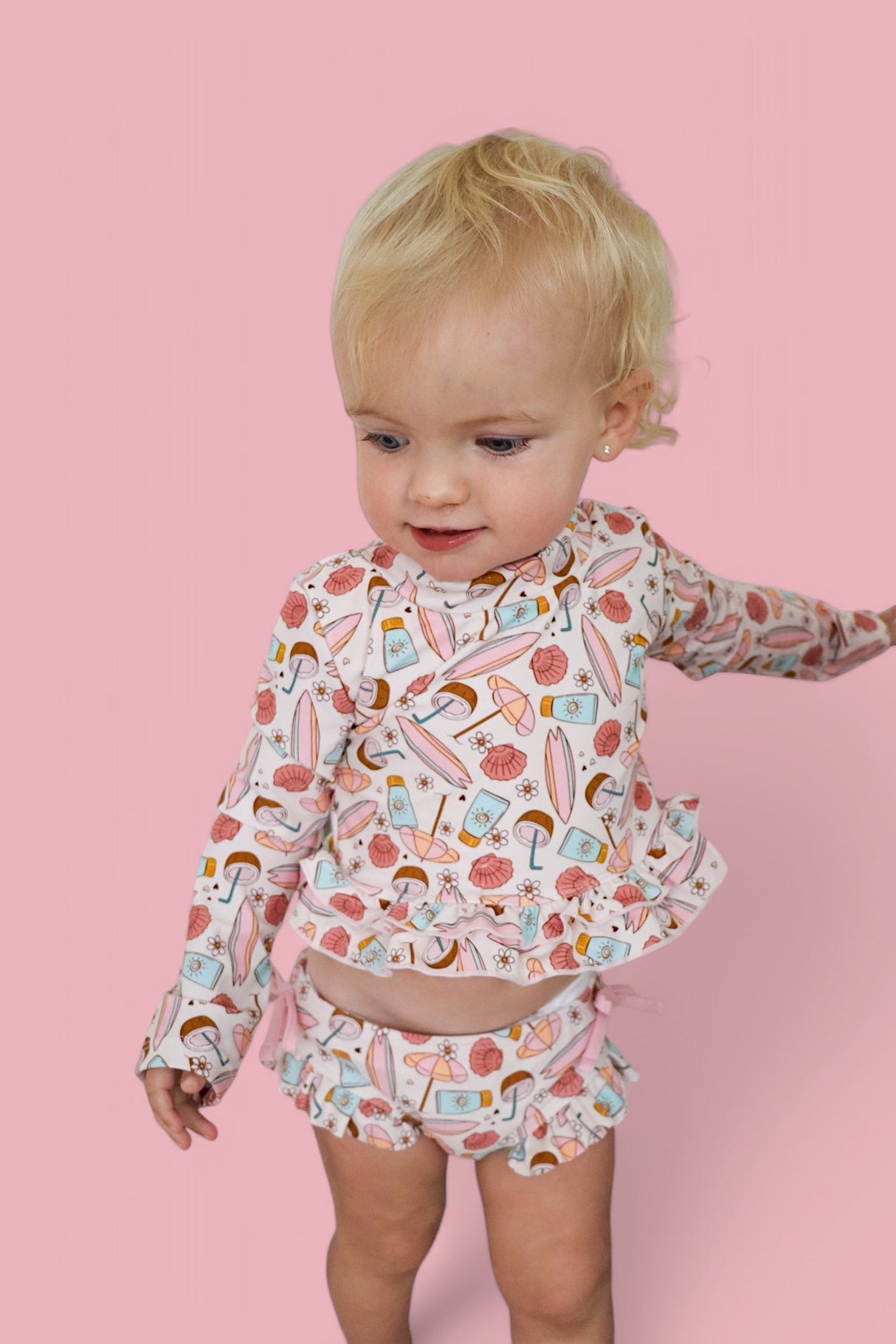 FUN IN THE SUN DREAM TWO-PIECE RASH GUARD RUFFLE SWIM SUIT from DREAM BIG LITTLE CO