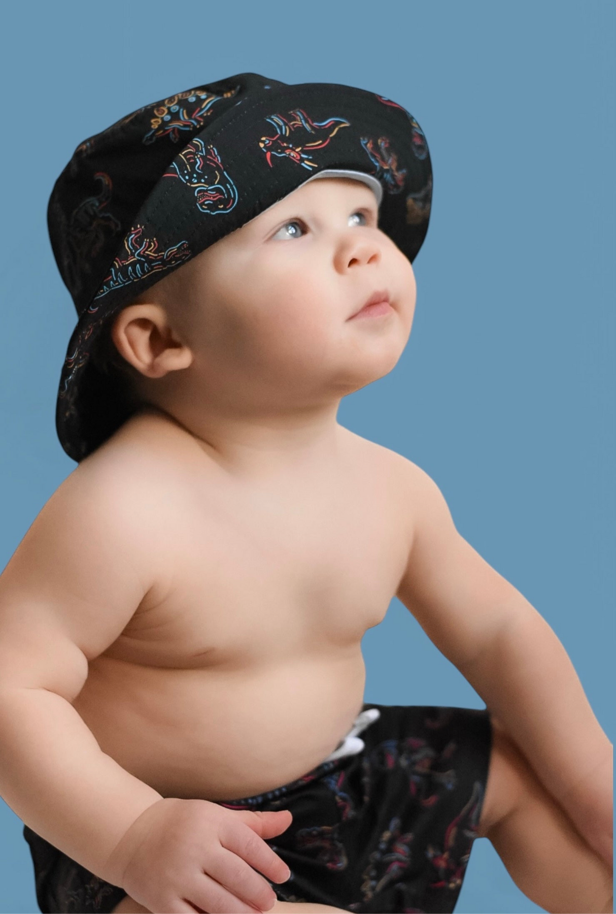 DINOSNORE DREAM BUCKET HAT from DREAM BIG LITTLE CO