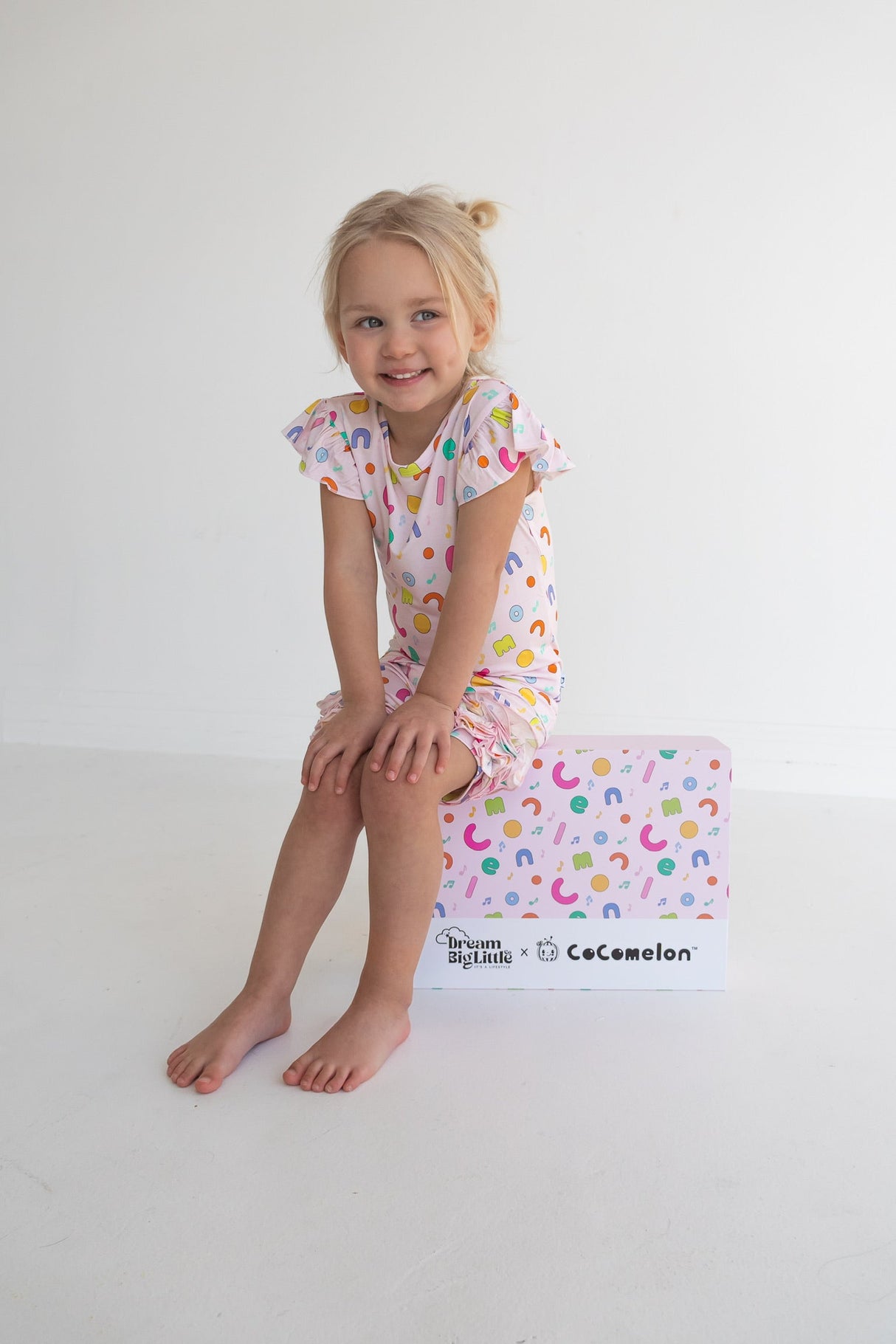 Dream Big Little Co x CoComelon ALPHABET DREAM CAP SEEVE TOP from DREAM BIG LITTLE CO