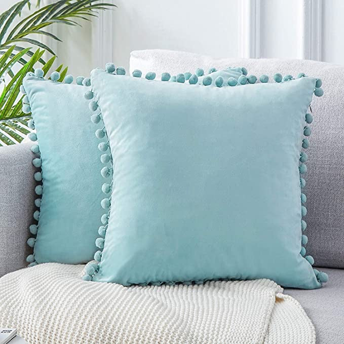 Velvet Pom Pom Cushion Covers from Moderny