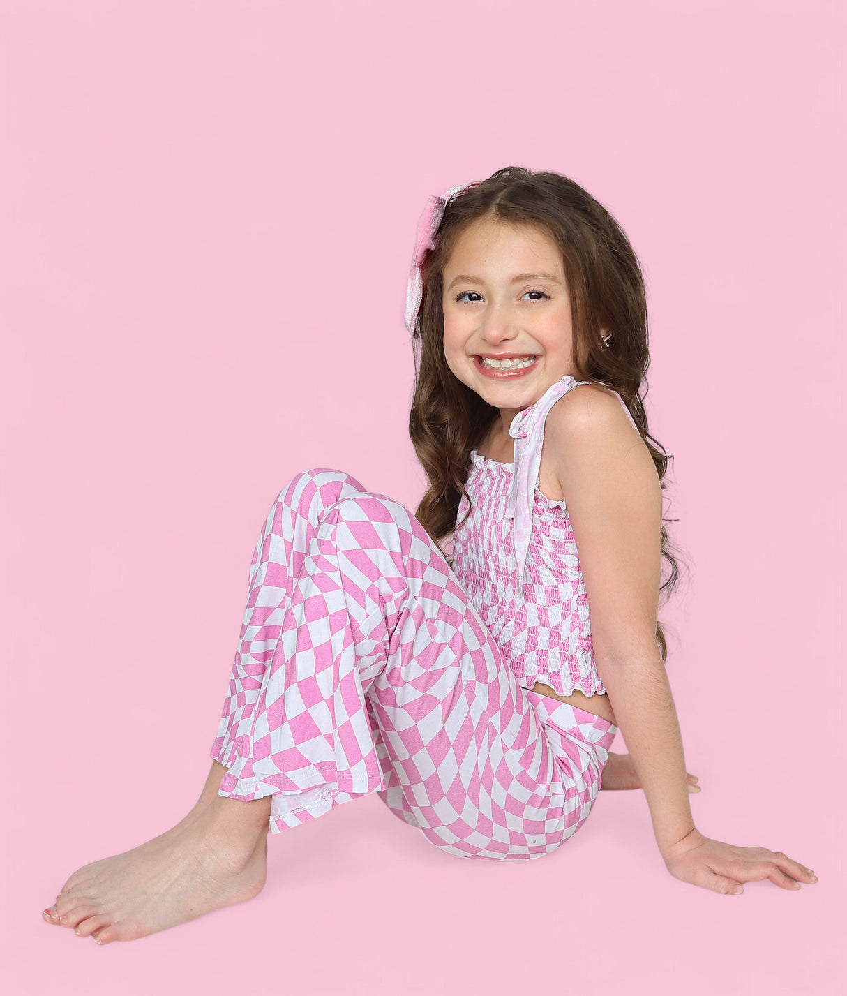 BUBBLEGUM WAVY CHECKERS DREAM SMOCKED FLARE SET from DREAM BIG LITTLE CO