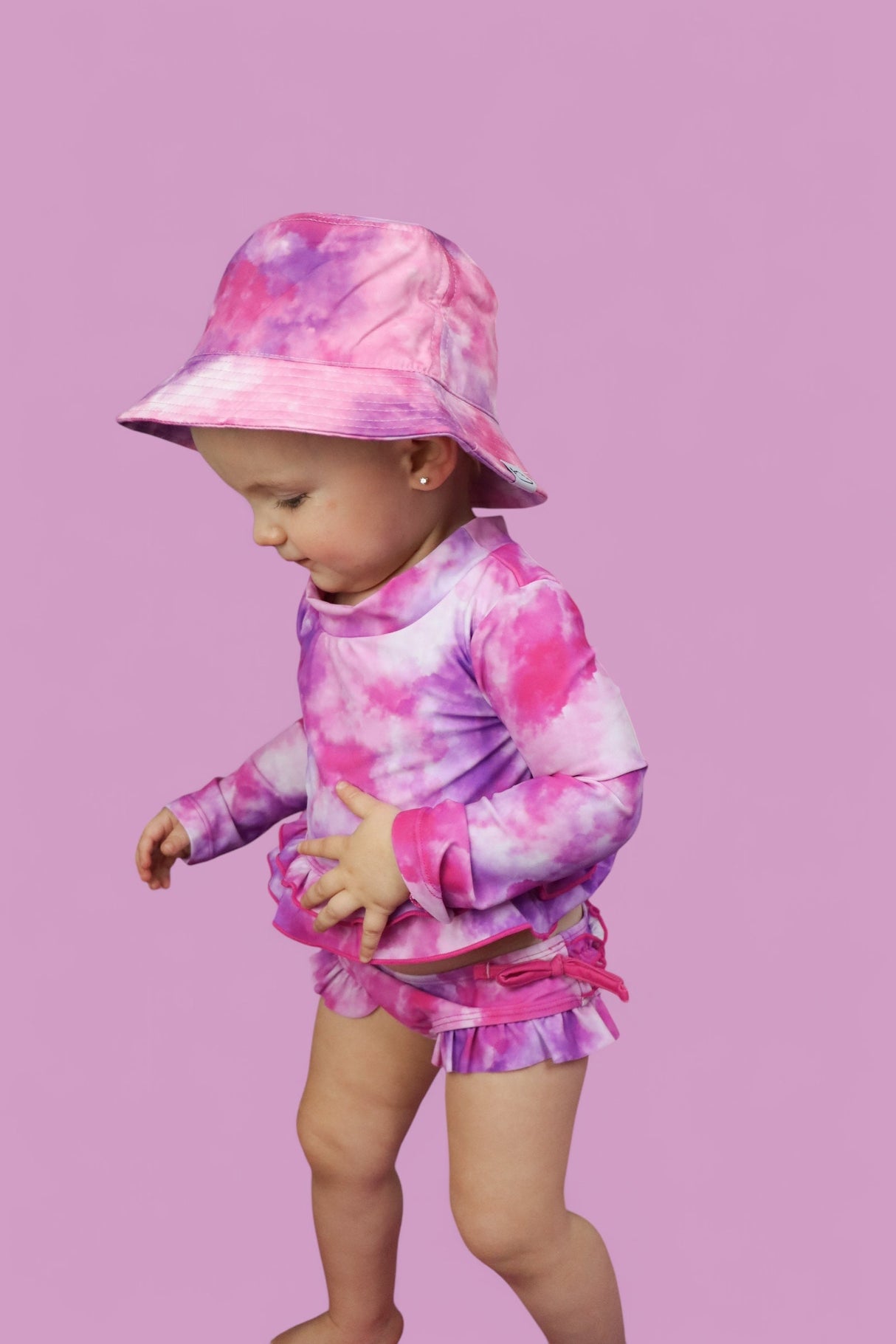 CANDY CLOUDS DREAM 2-PIECE RASH GUARD RUFFLE SWIM SUIT from DREAM BIG LITTLE CO