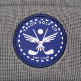 Gray Knit Beanie w/ Navy Eagle Circle Logo from Talon Golf LLC