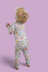 BOW GARDEN DREAM RUFFLE ROMPER from DREAM BIG LITTLE CO