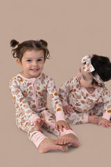 FLOWERS AND BOOTS DREAM ROMPER from DREAM BIG LITTLE CO