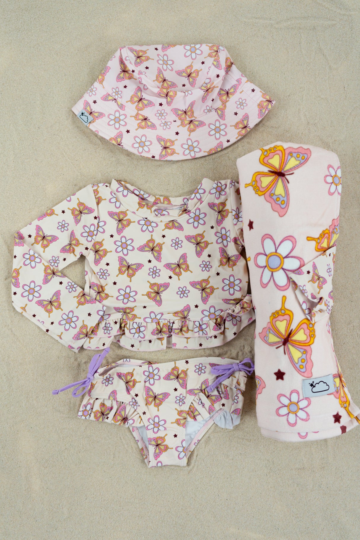 BLOSSOMIN’ BUTTERFLY DREAM 2-PIECE RASH GUARD RUFFLE SWIM SUIT from DREAM BIG LITTLE CO