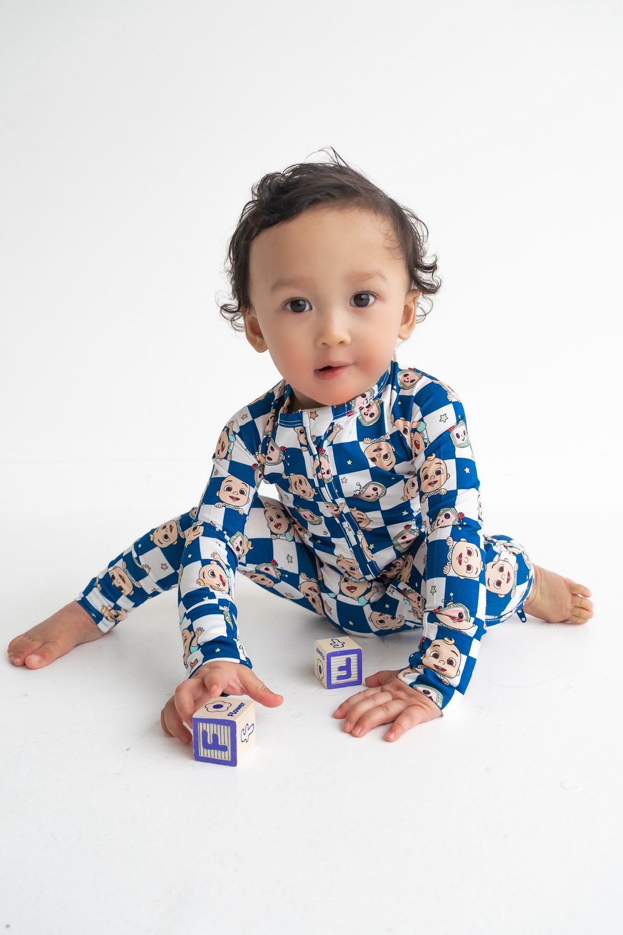Dream Big Little Co x CoComelon JJ STARRY NIGHT CHECKERS DREAM ROMPER from DREAM BIG LITTLE CO