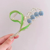 LILY FLOWER HAIR CLIP from Ashlen