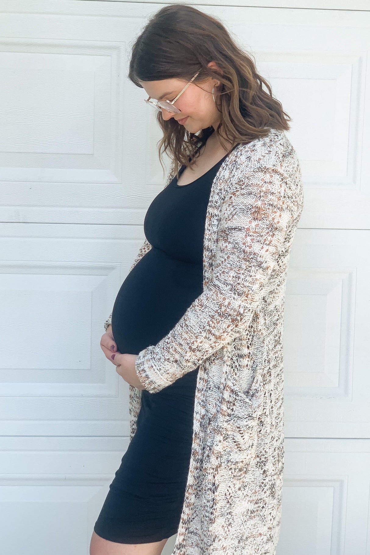 Black Solid Ruched Fitted Maternity Bodycon Midi Dress from PinkBlush