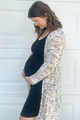 Black Solid Ruched Fitted Maternity Bodycon Midi Dress from PinkBlush