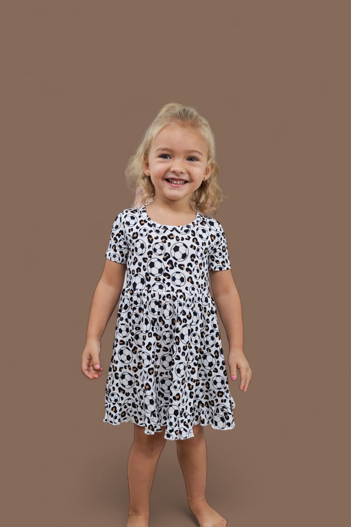 WILD GOALS DREAM RUFFLE DRESS from DREAM BIG LITTLE CO