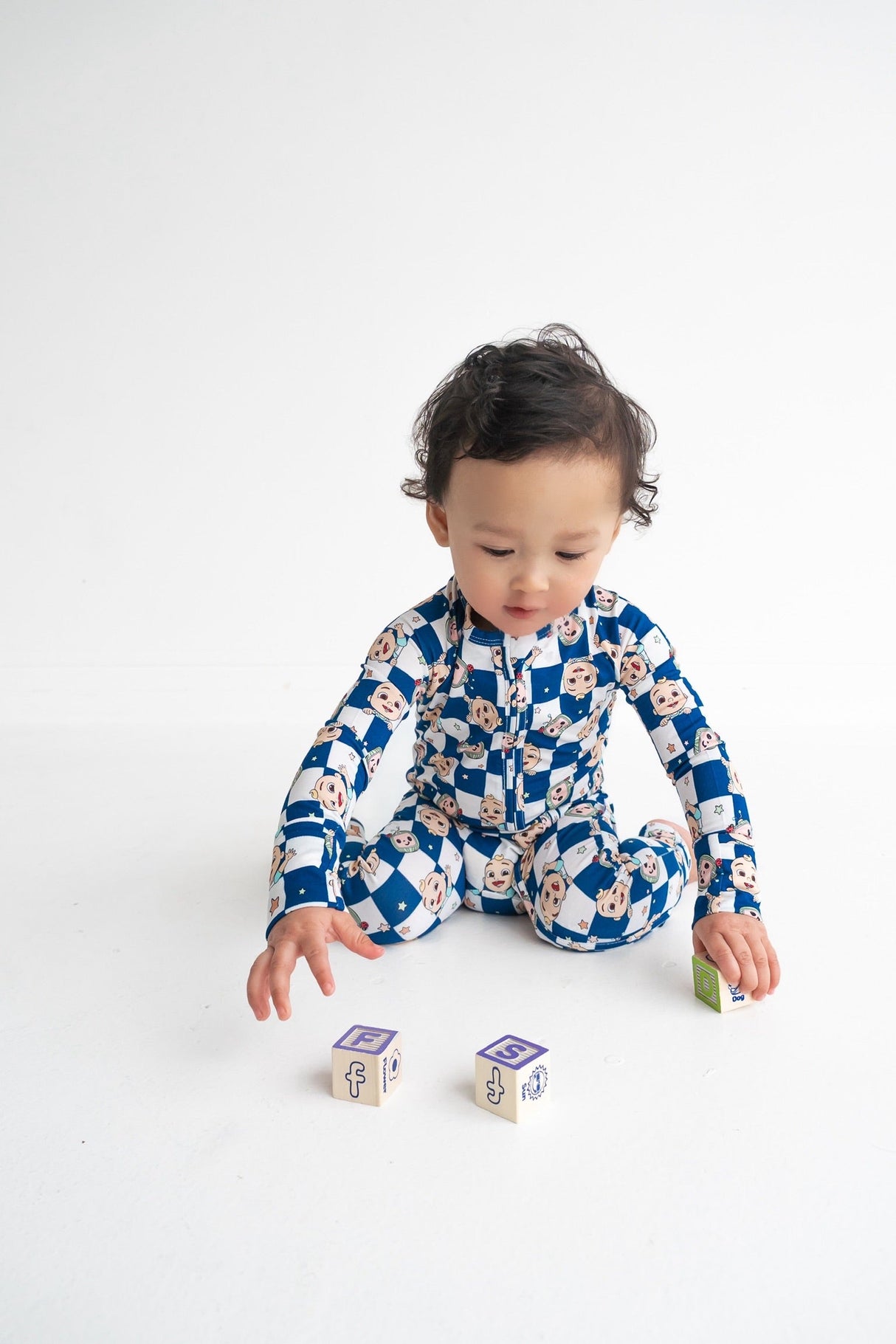 Dream Big Little Co x CoComelon JJ STARRY NIGHT CHECKERS DREAM ROMPER from DREAM BIG LITTLE CO