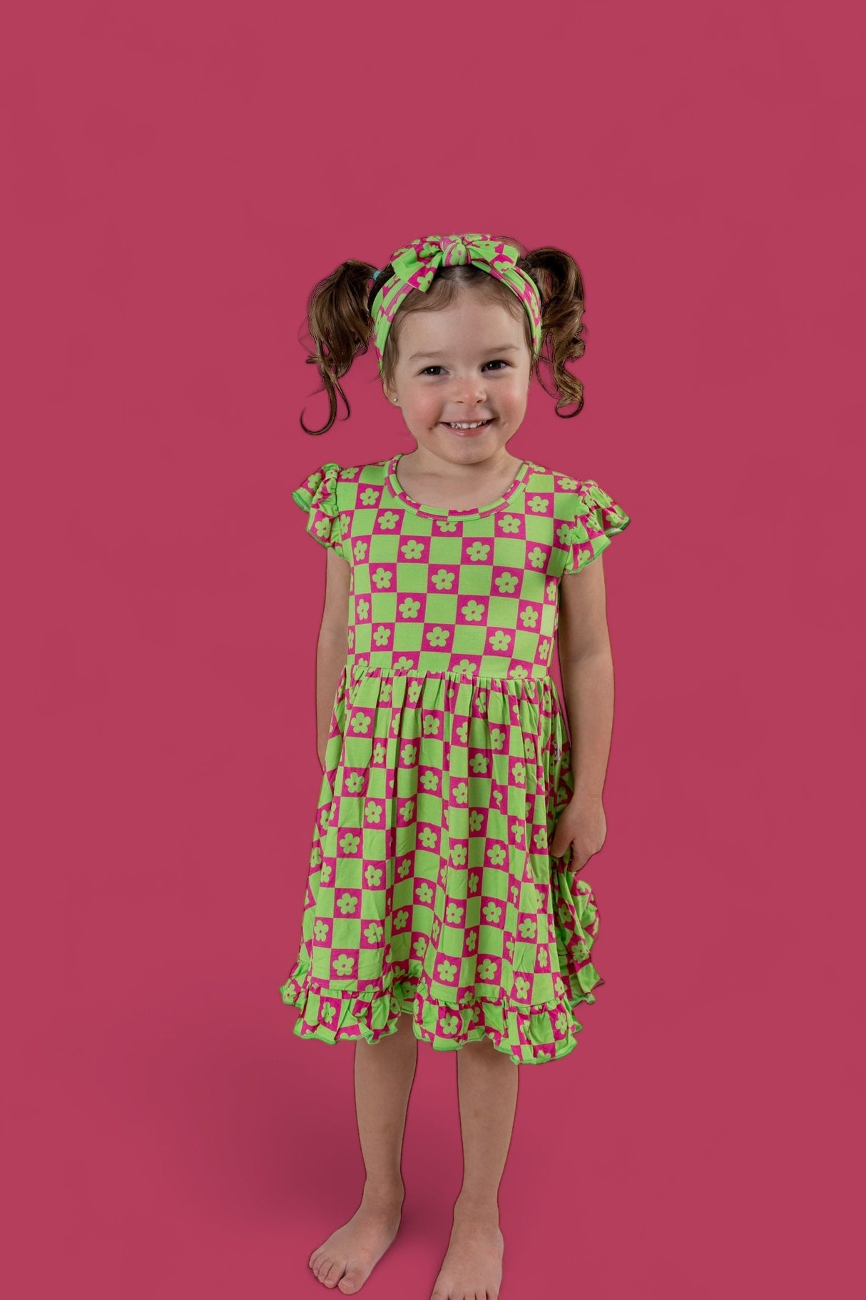 WILD DAISY CHECKERS DREAM RUFFLE DRESS from DREAM BIG LITTLE CO