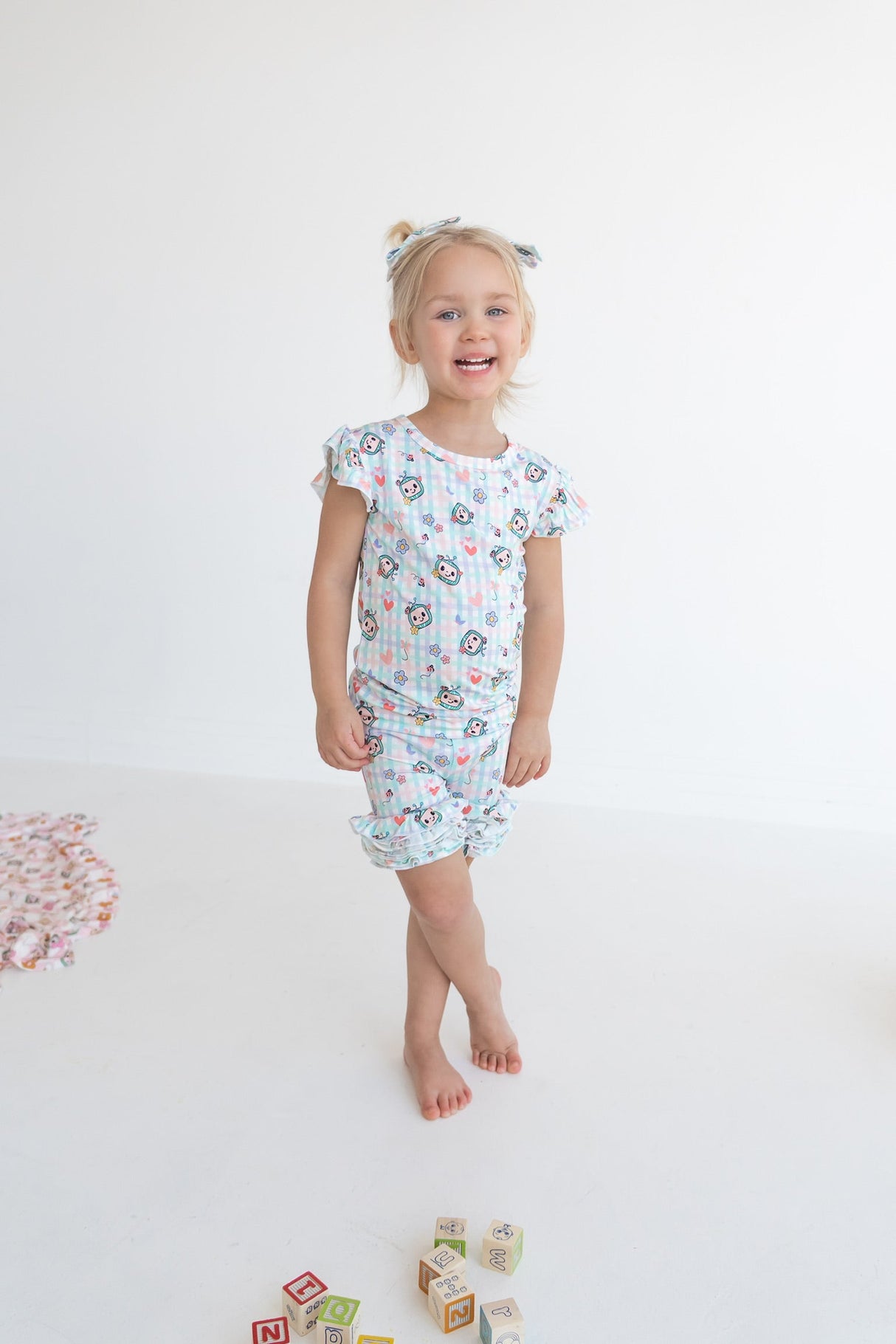 Dream Big Little Co x CoComelon SPRINGTIME MELON DREAM RUFFLE SHORTS from DREAM BIG LITTLE CO