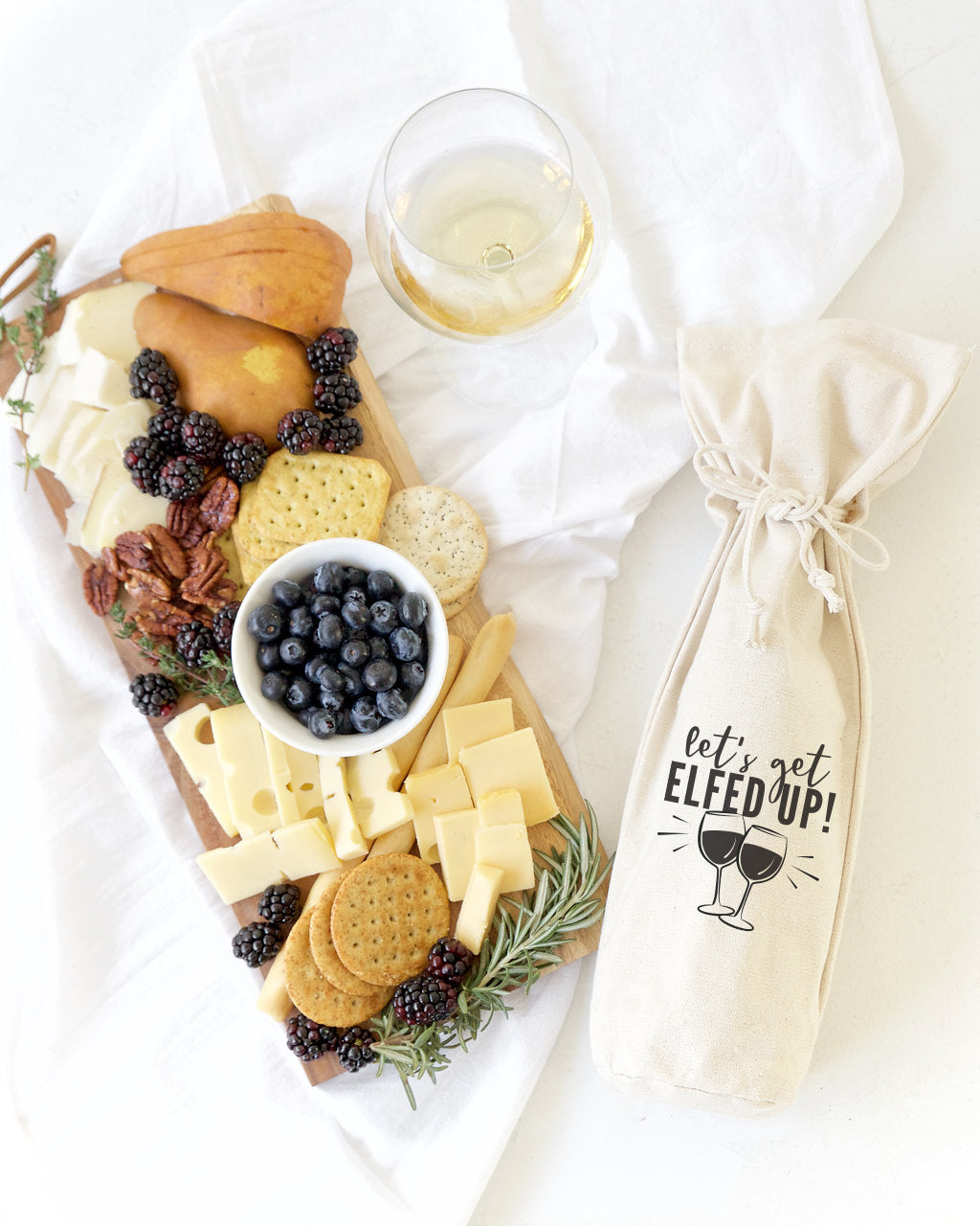 Let's Get Elfed Up! Christmas Canvas Wine Bag from The Cotton & Canvas Co.