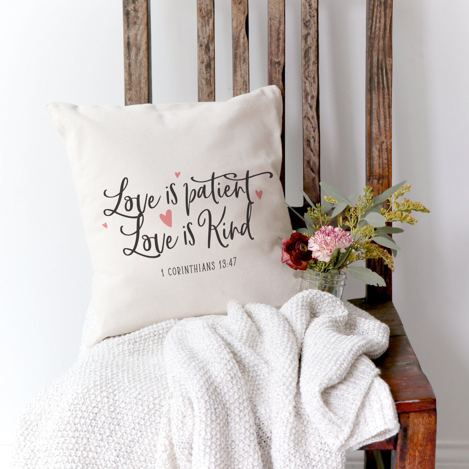 Love is patient. Love is kind. 1 Corinthians 13:47 Pillow Cover from The Cotton & Canvas Co.